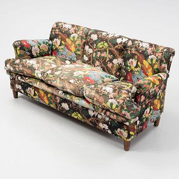 A model 703 sofa by Josef Frank for Firma Svenskt Tenn.