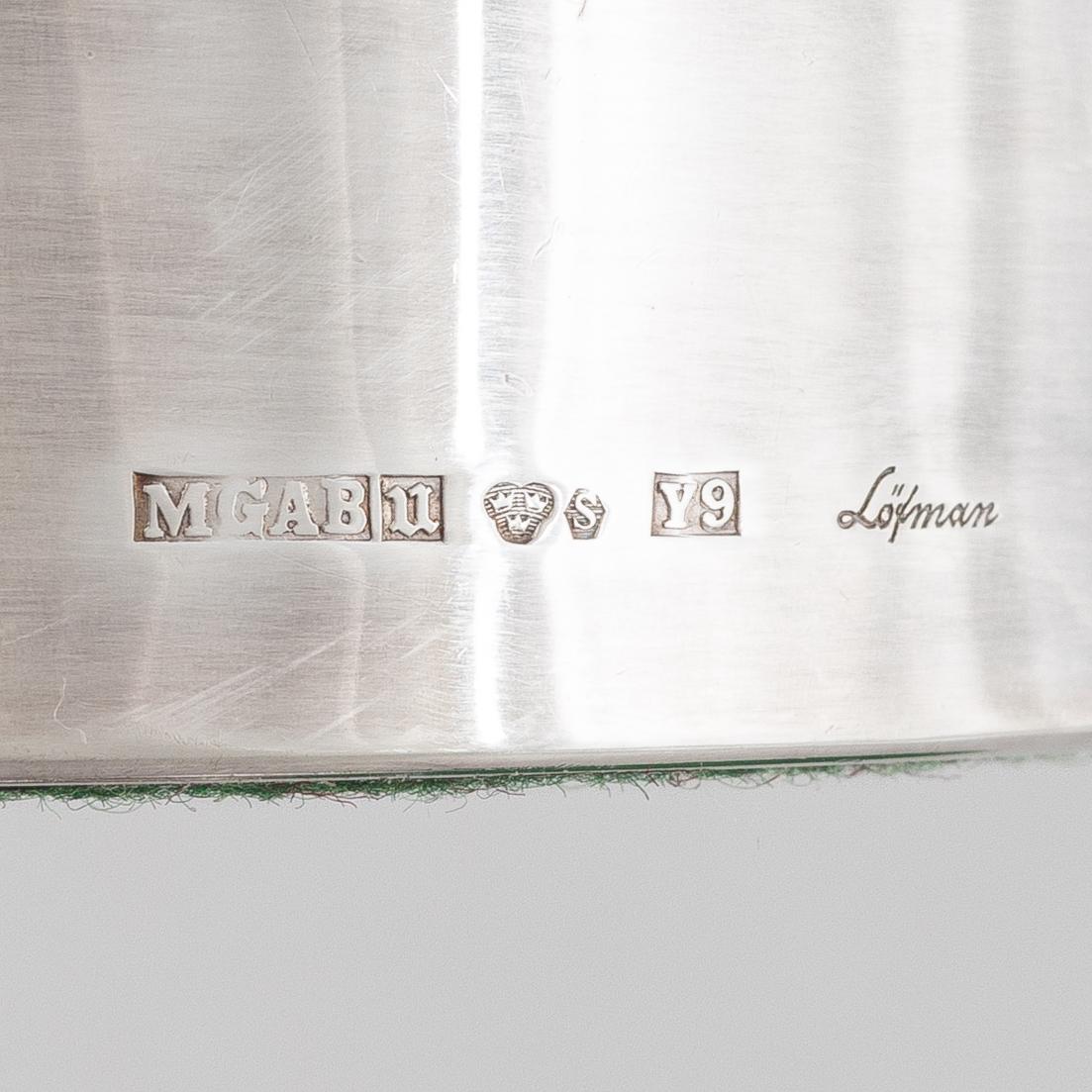 A pair of Swedish silver candlesticks, marks of Eric Löfman, MGAB, Uppsala 1973.