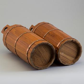 a pair of teak umbrella stands from the second half of the 20th century.