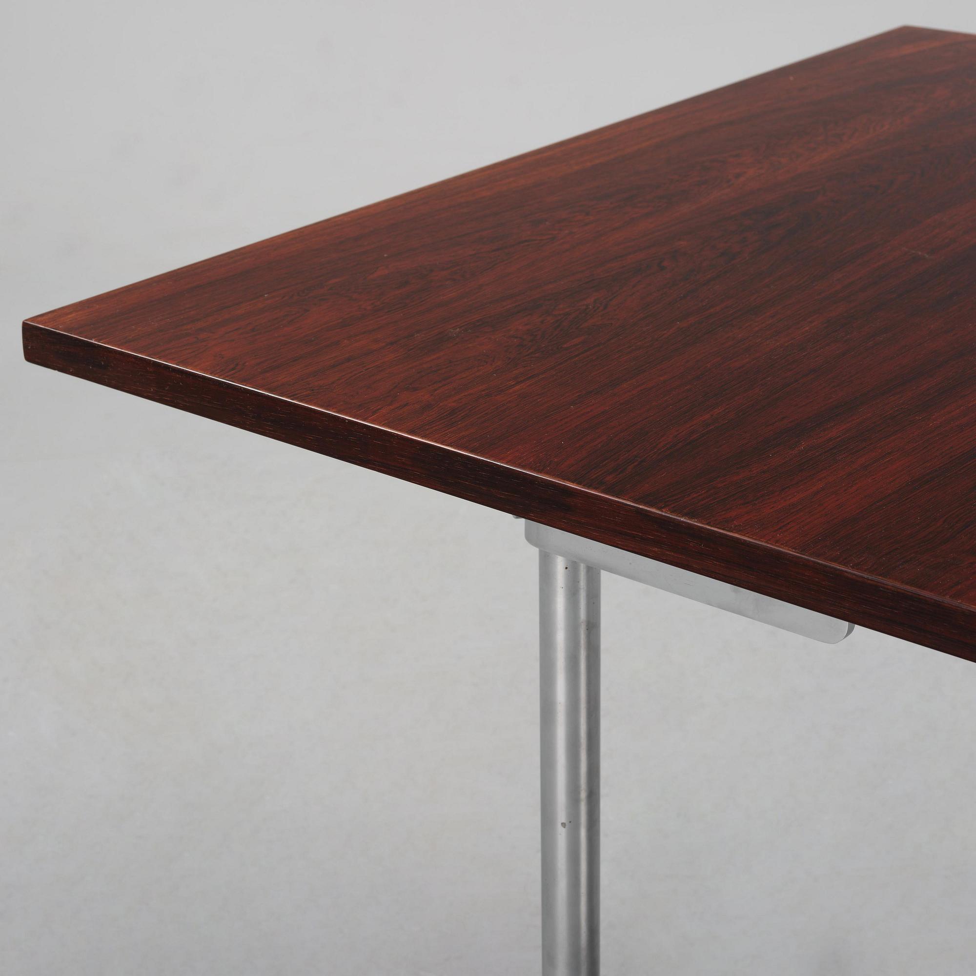 Hans J. Wegner, a rosewood "AT-322" table, Andreas Tuck, Denmark, 1960s.