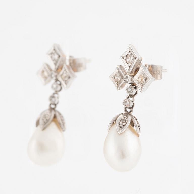 Earrings, a pair, gold, with drop-shaped pearls and small diamonds.