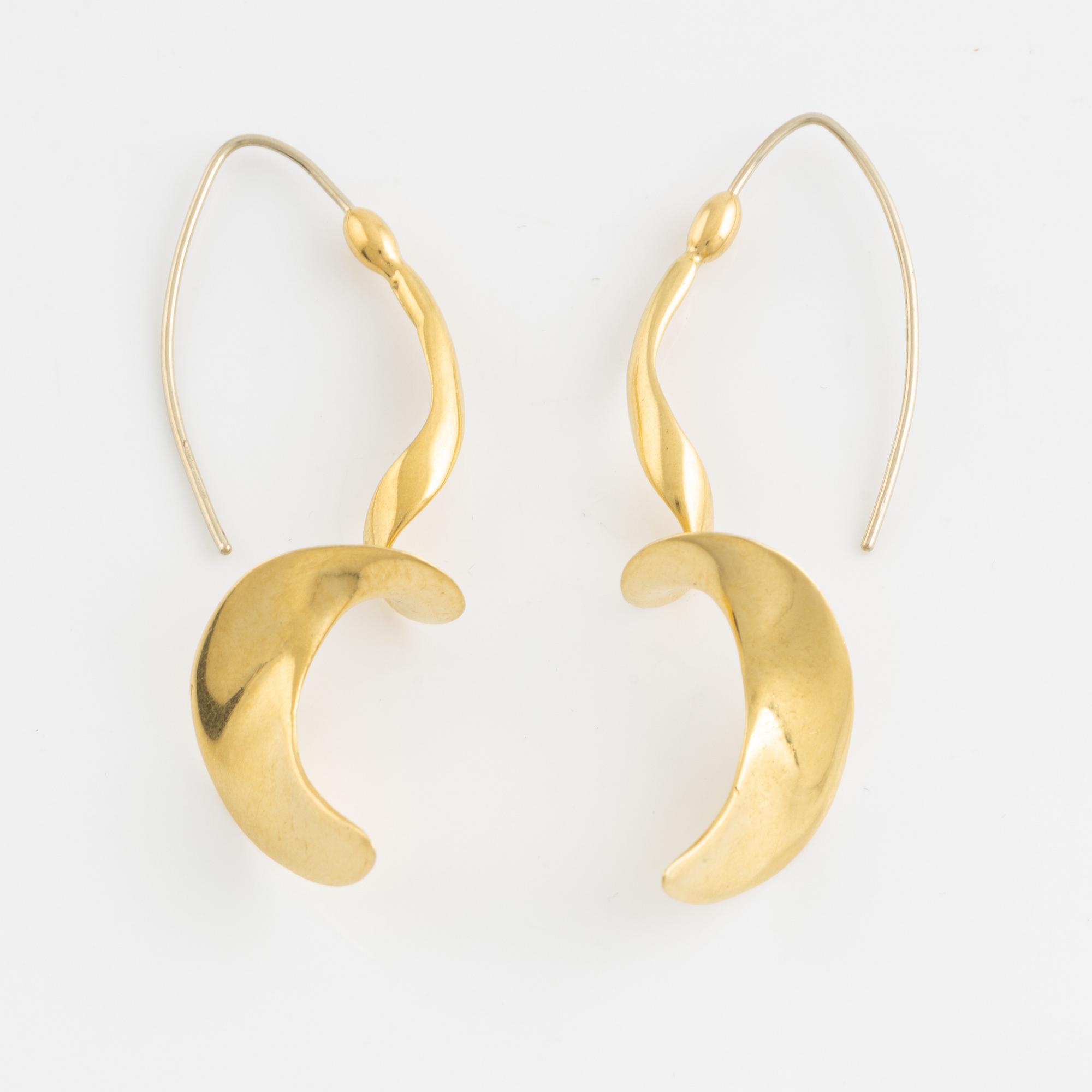 18K gold earrings.