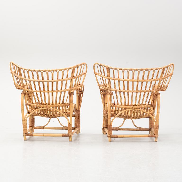 A pair of rattan easy chairs, possibly Viggo Boesen.