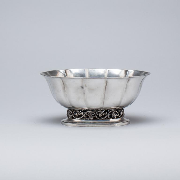 SKÅL, tenn, Just Andersen. 1900-talets första hälft.