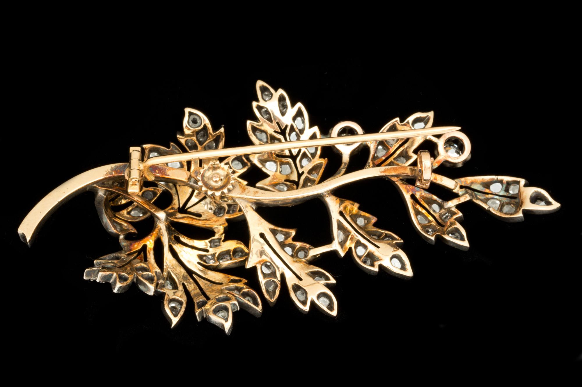 BROSCH, guld och silver med gammalslipade diamanter samt rosenstenar. Vikt ca 20 g.