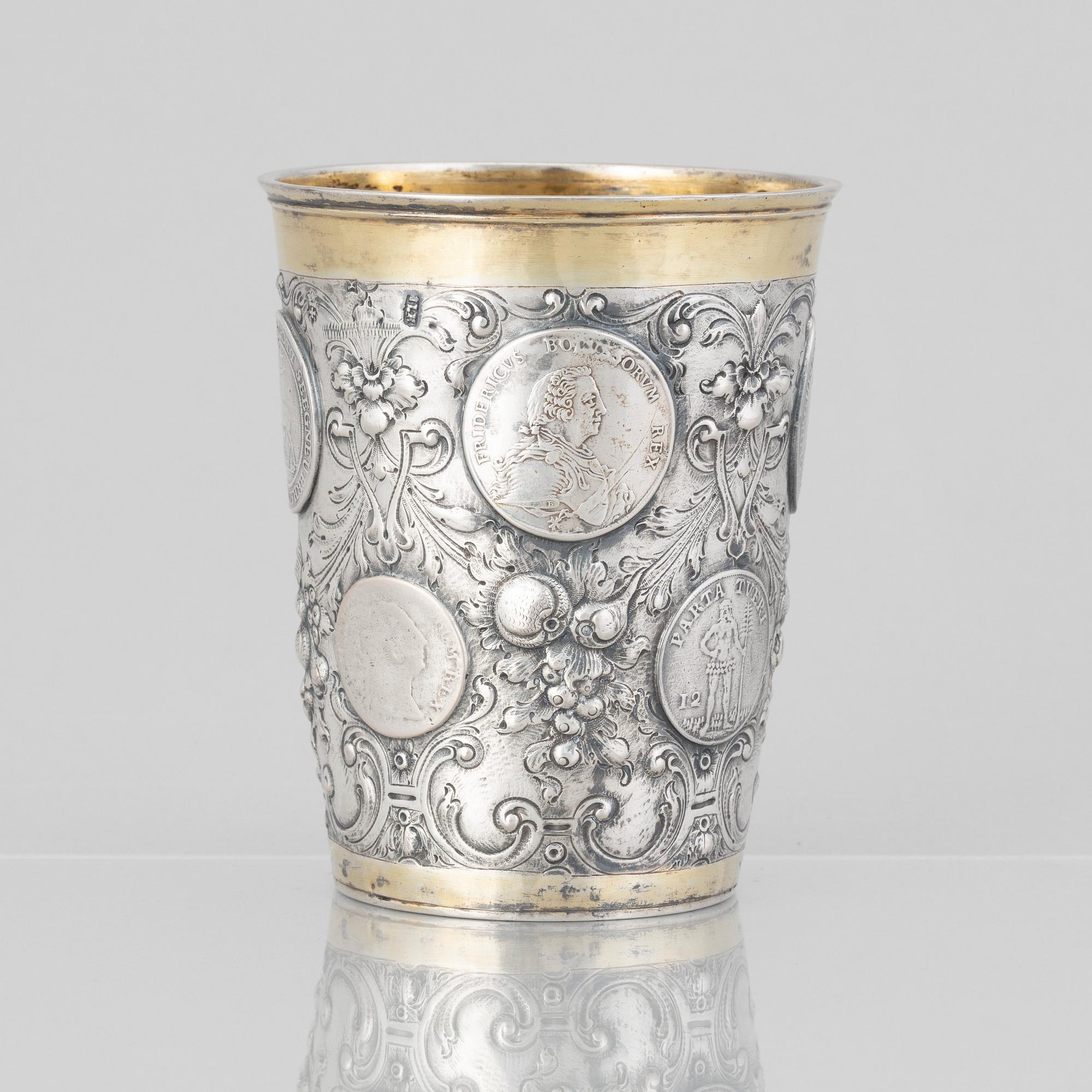 A Prussian 18th century parcel-gilt beaker, makers mark Johann Leopold Käwerstein, Königsberg 1754-1761.