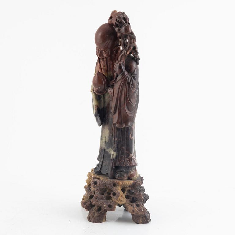 A Chinese soapstone figure of Shoulao, 20th century.