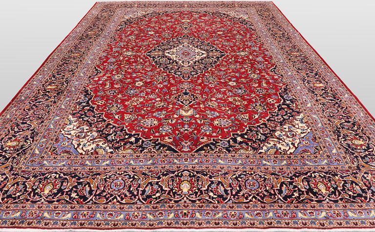 A Keshan carpet, 390 x 297 cm.