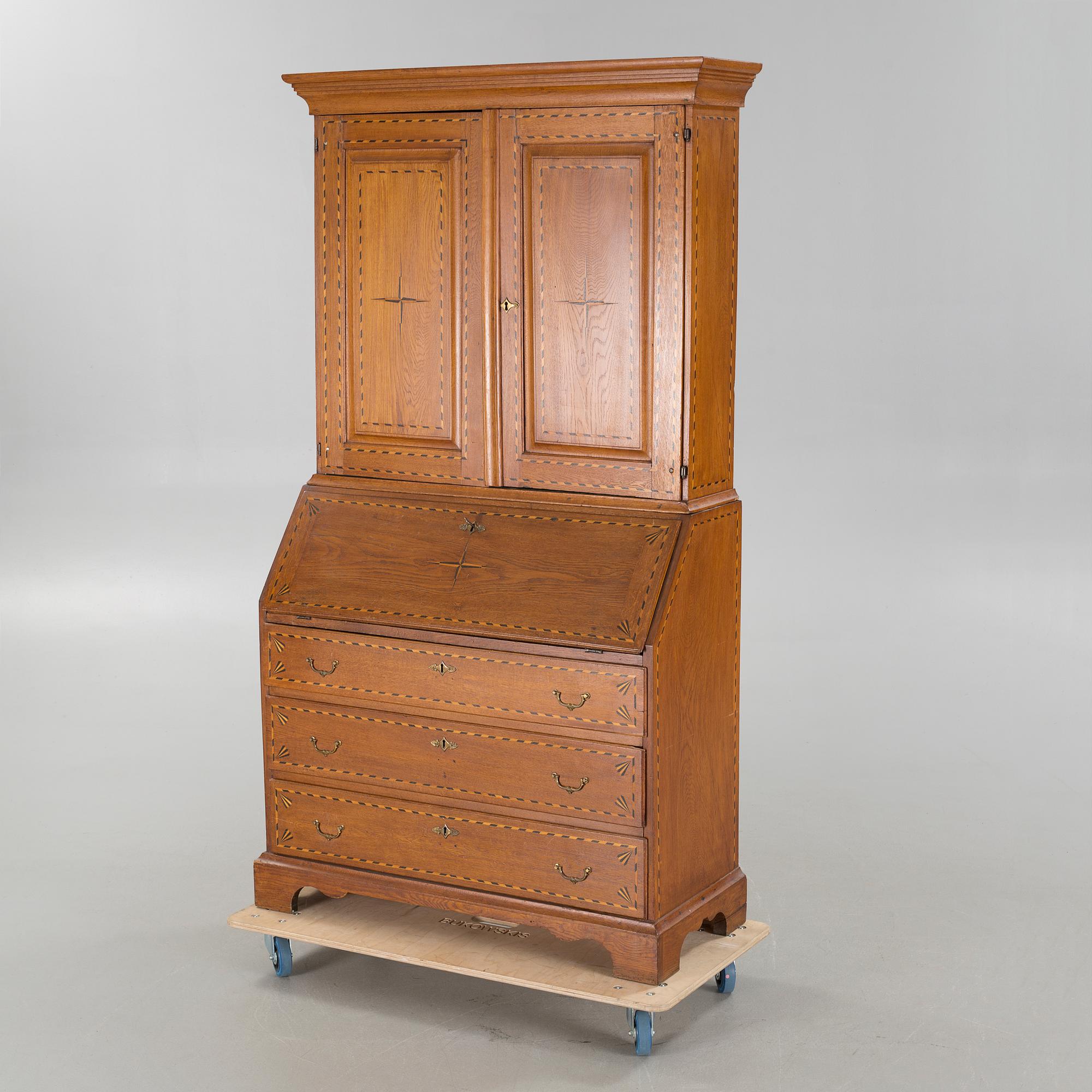A writing cabinet, probably from Småland, first half of the 19th century.