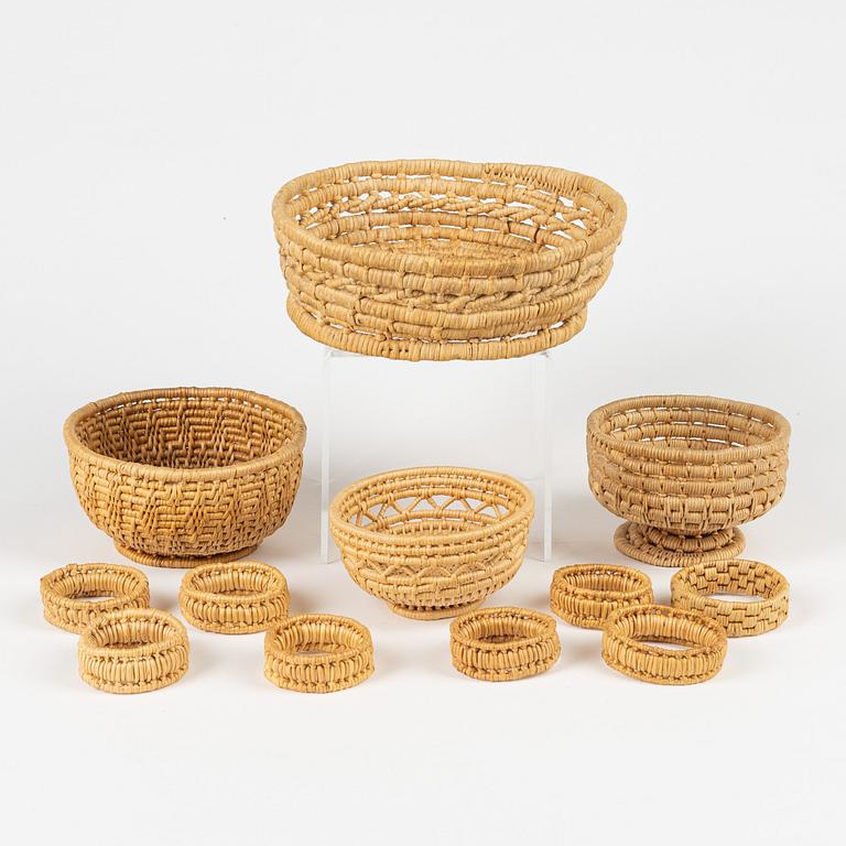 Four root bowls and eight napkin rings.