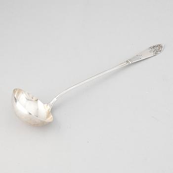 A Swedish silver "Empire" soup ladle, maker's mark Carl Winnerstrand, Stockholm, 1908.