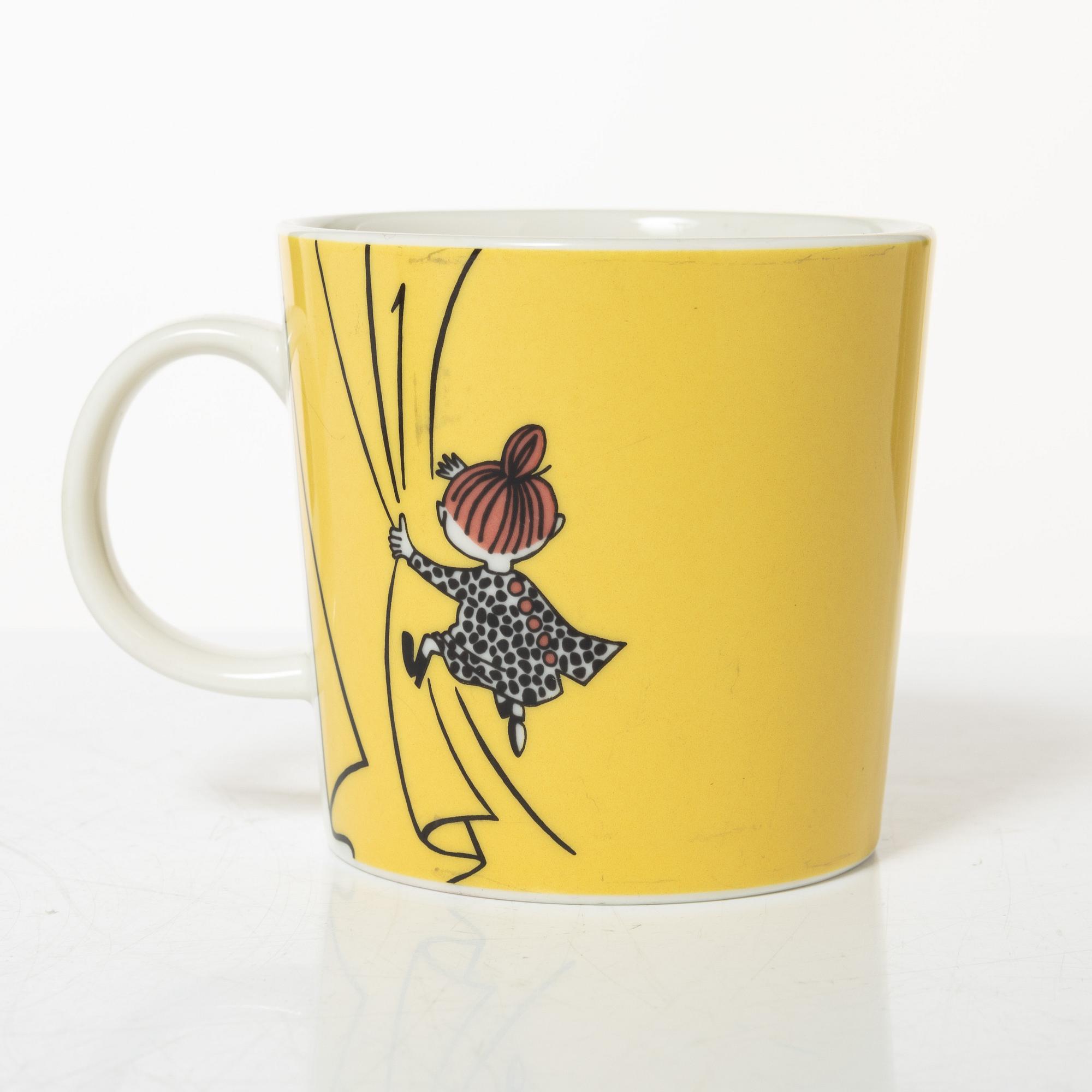 A set of 31 Moomin mugs, Arabia, Finland.