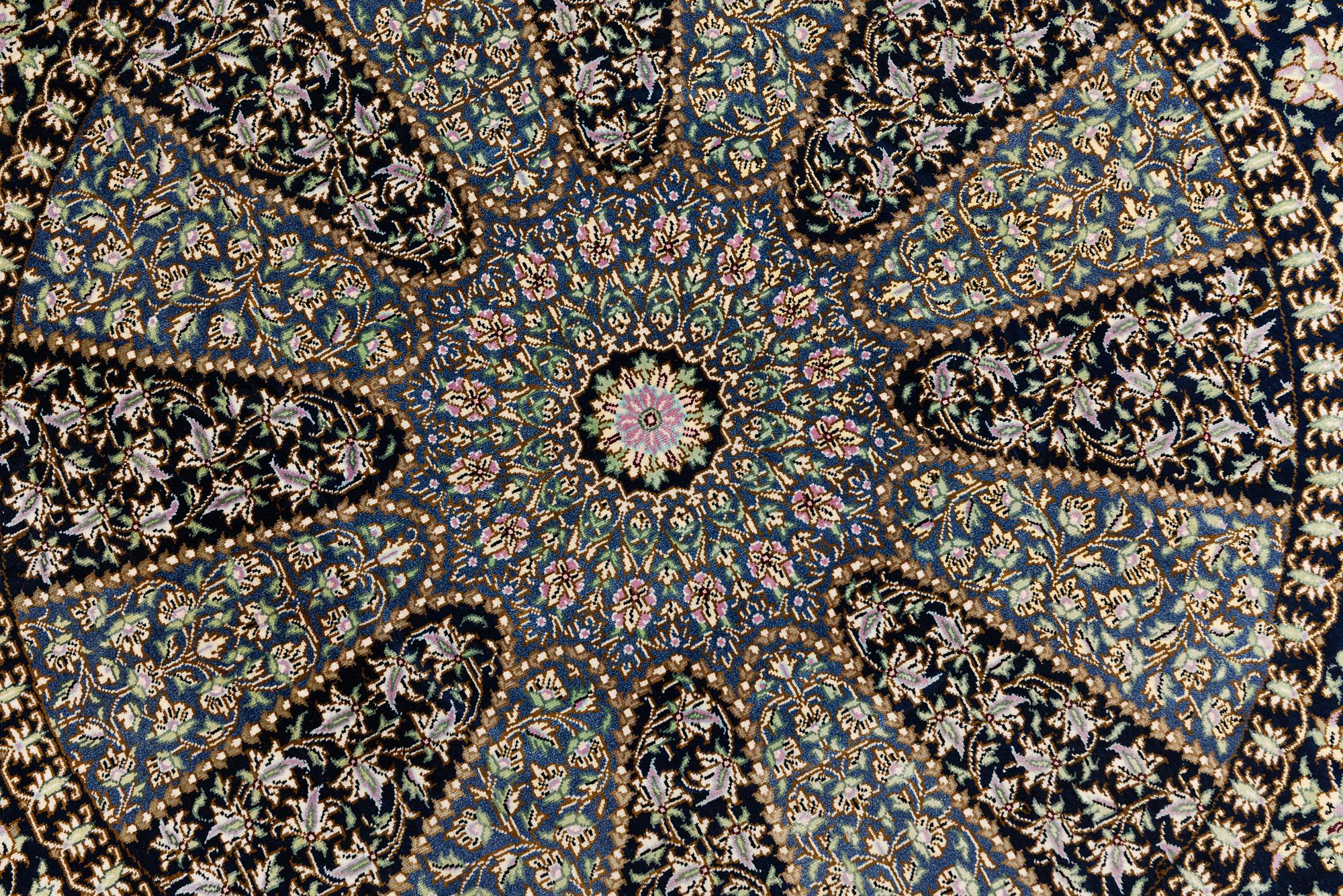 Rug, Ghom, signed, diameter 80 cm.