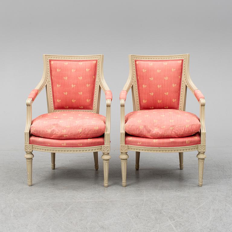A pair of gustavian style armchairs, second half of the 20th century.