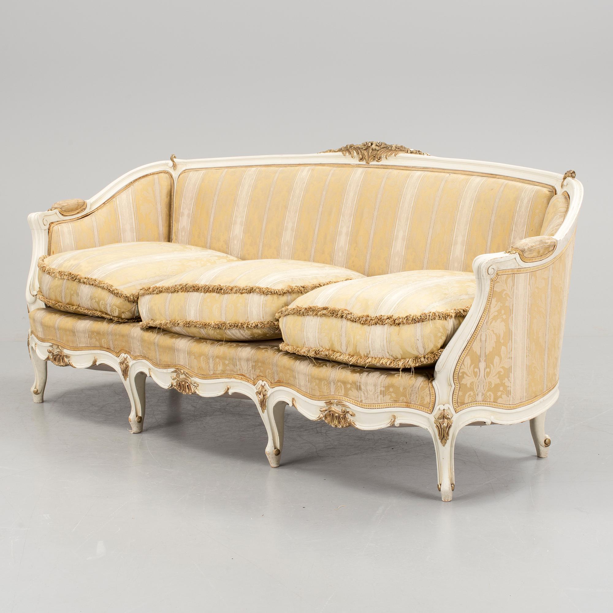 a 1930s rococo style sofa.