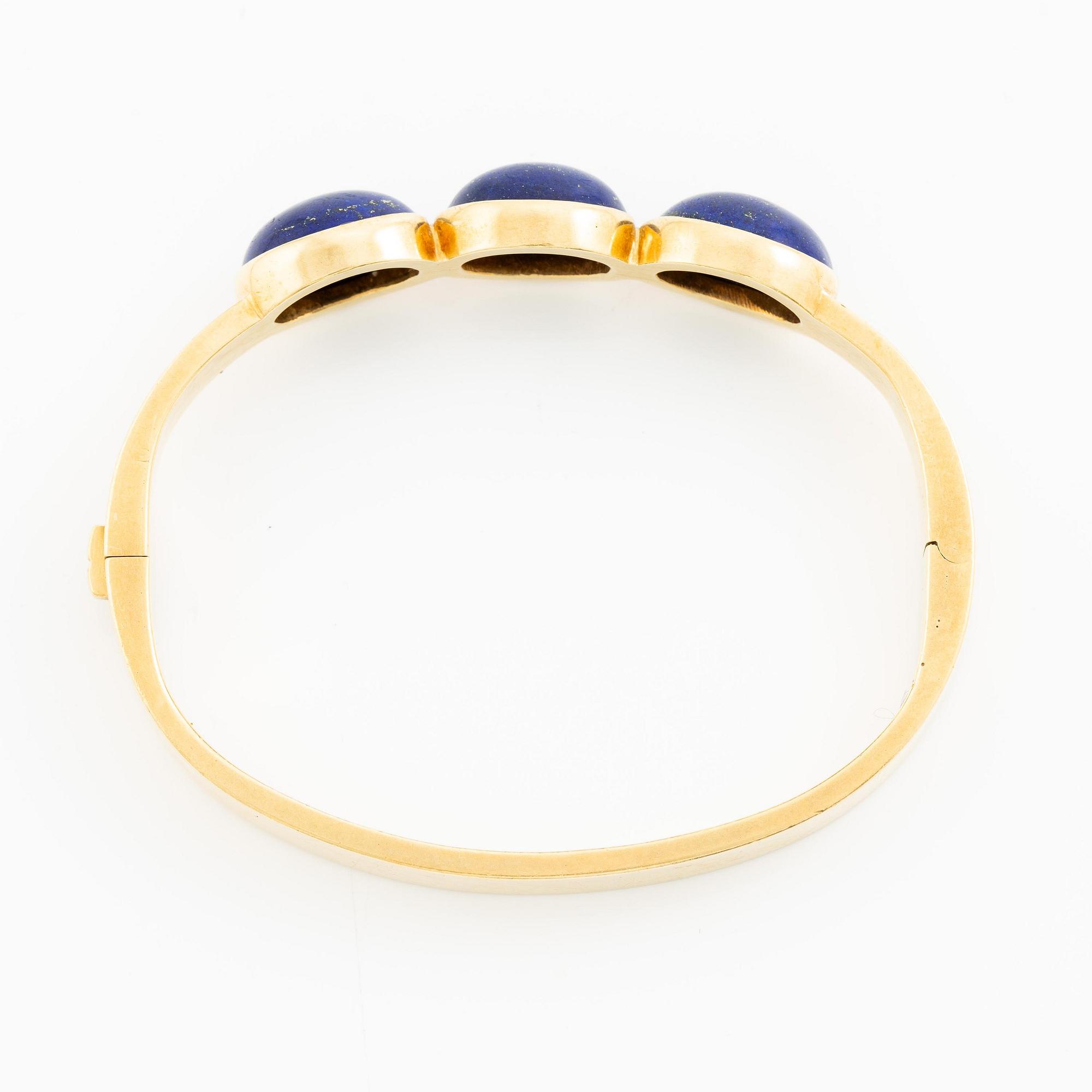 Wiwen Nilsson, a bracelet, 18K gold with lapis lazuli, Lund 1965.