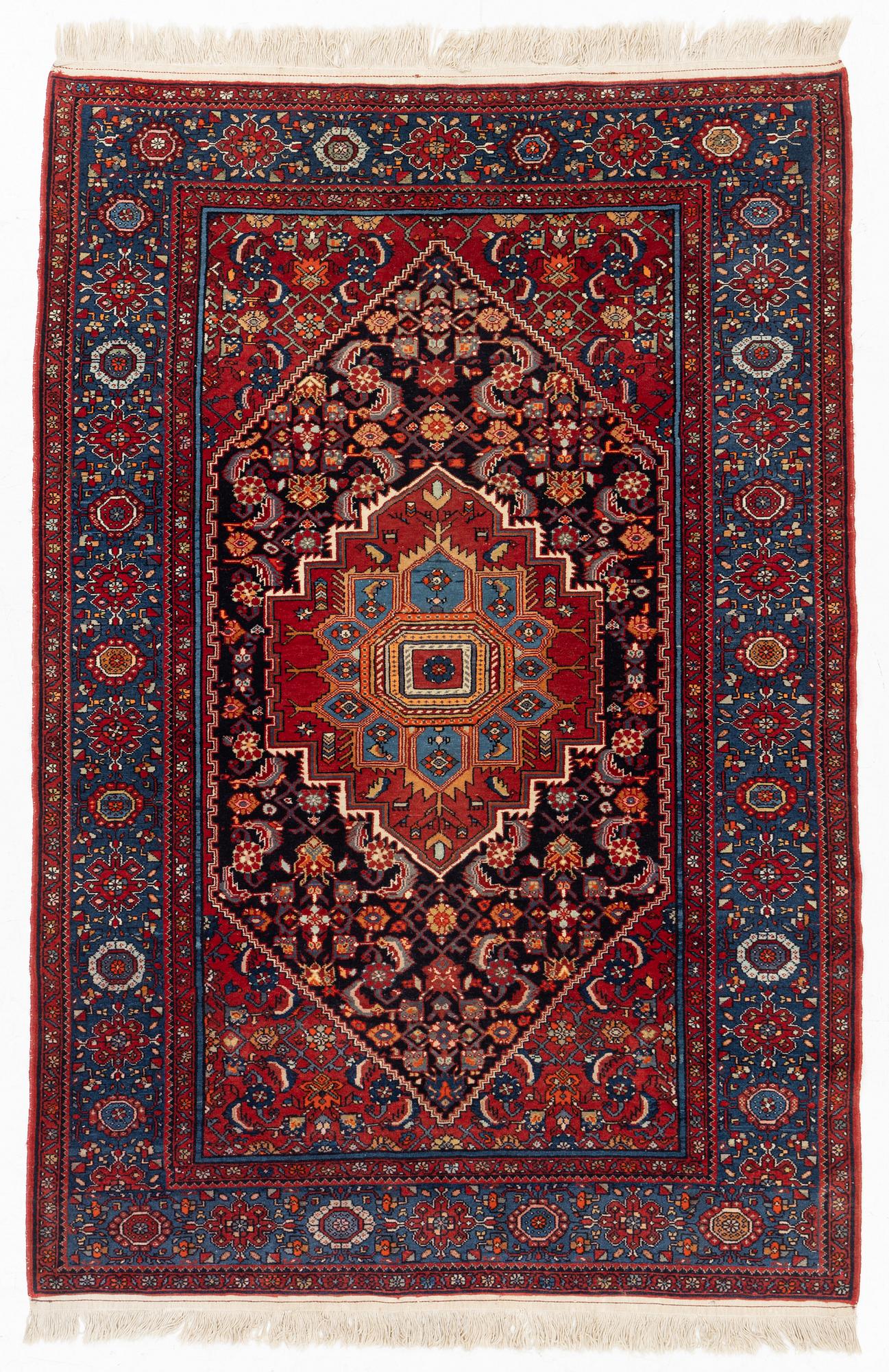 An oriental rug, old, c. 204 x 139 cm.