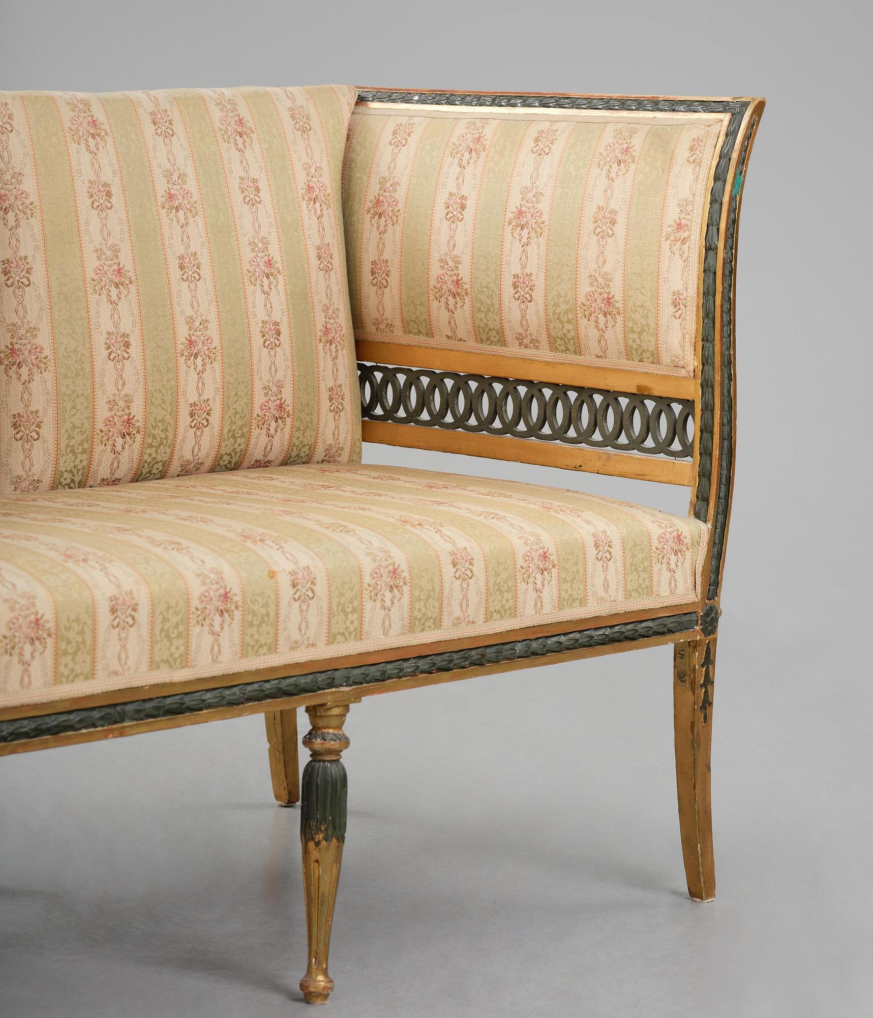 A late Gustavian giltwood sofa, Stockholm, late 18th century.