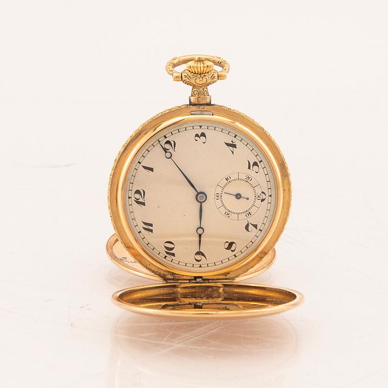 A 14K gold pocket watch hunter.