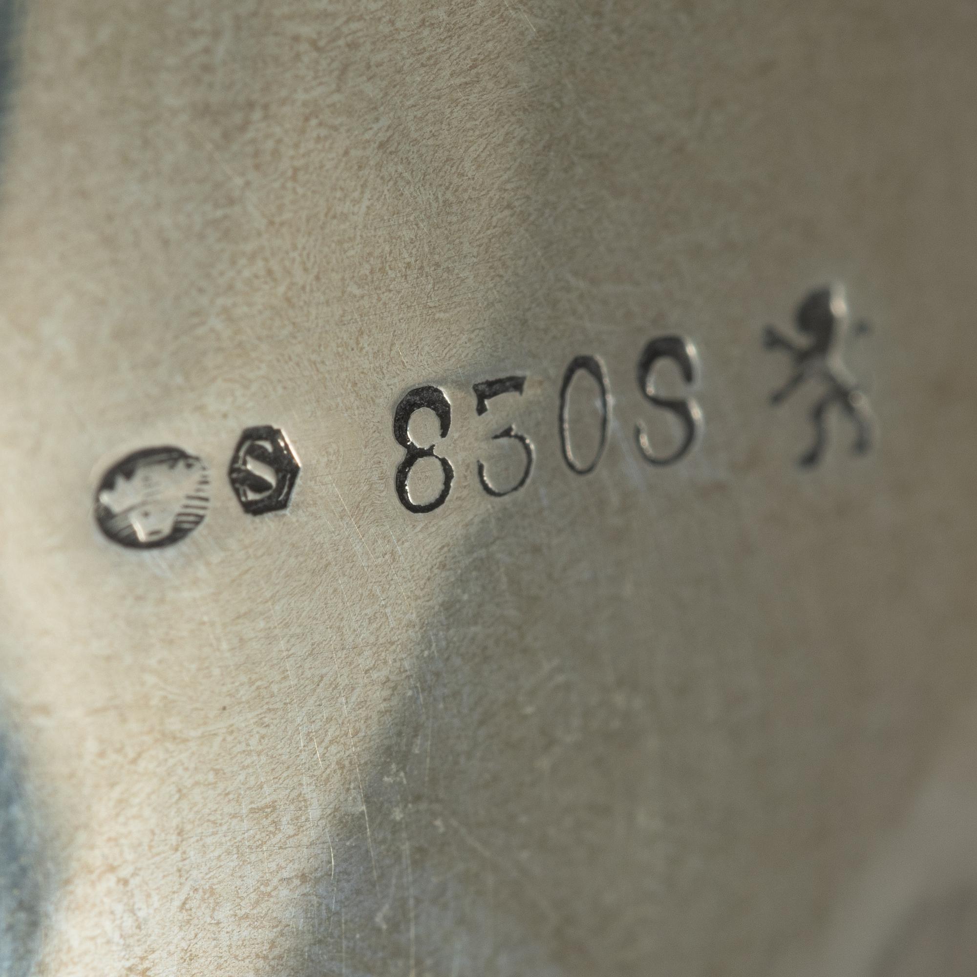 A Norwegian silver Rococo style coffee pot, cream jug, and sugar bowl, Norsk Filigransfabrikk, Oslo circa 1920.