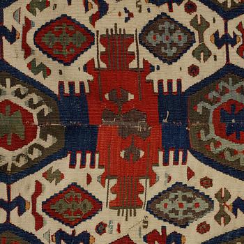 A carpet, a kilim, an antique Anatolian, ca 310-326 x 183,5-192 cm.