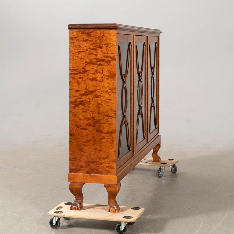 Display cabinet, 1920s.