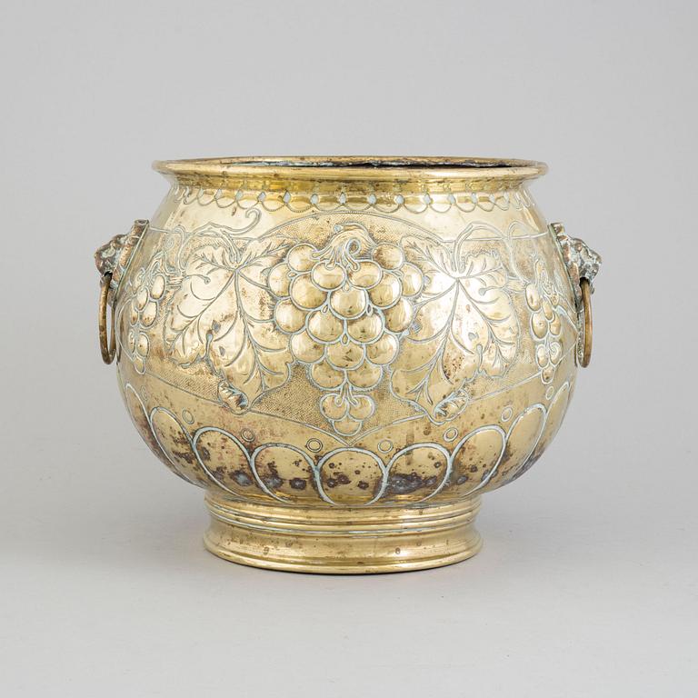 A 19TH CENTURY BRASS FLOWER POT.