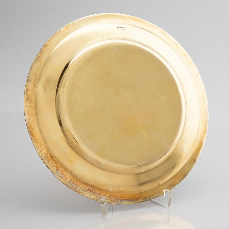 Twelve silver-gilt plates, mark of company C.G. Hallberg, Stockholm 1913-1917.