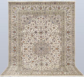 A Keshan carpet, signed, c. 395 x 295 cm.