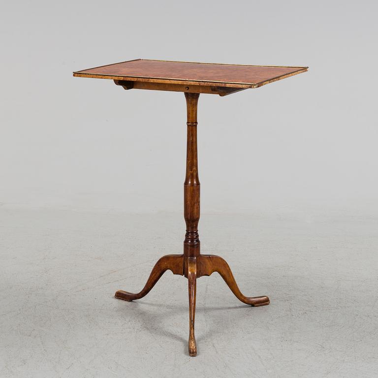 An early 19th century folding table.