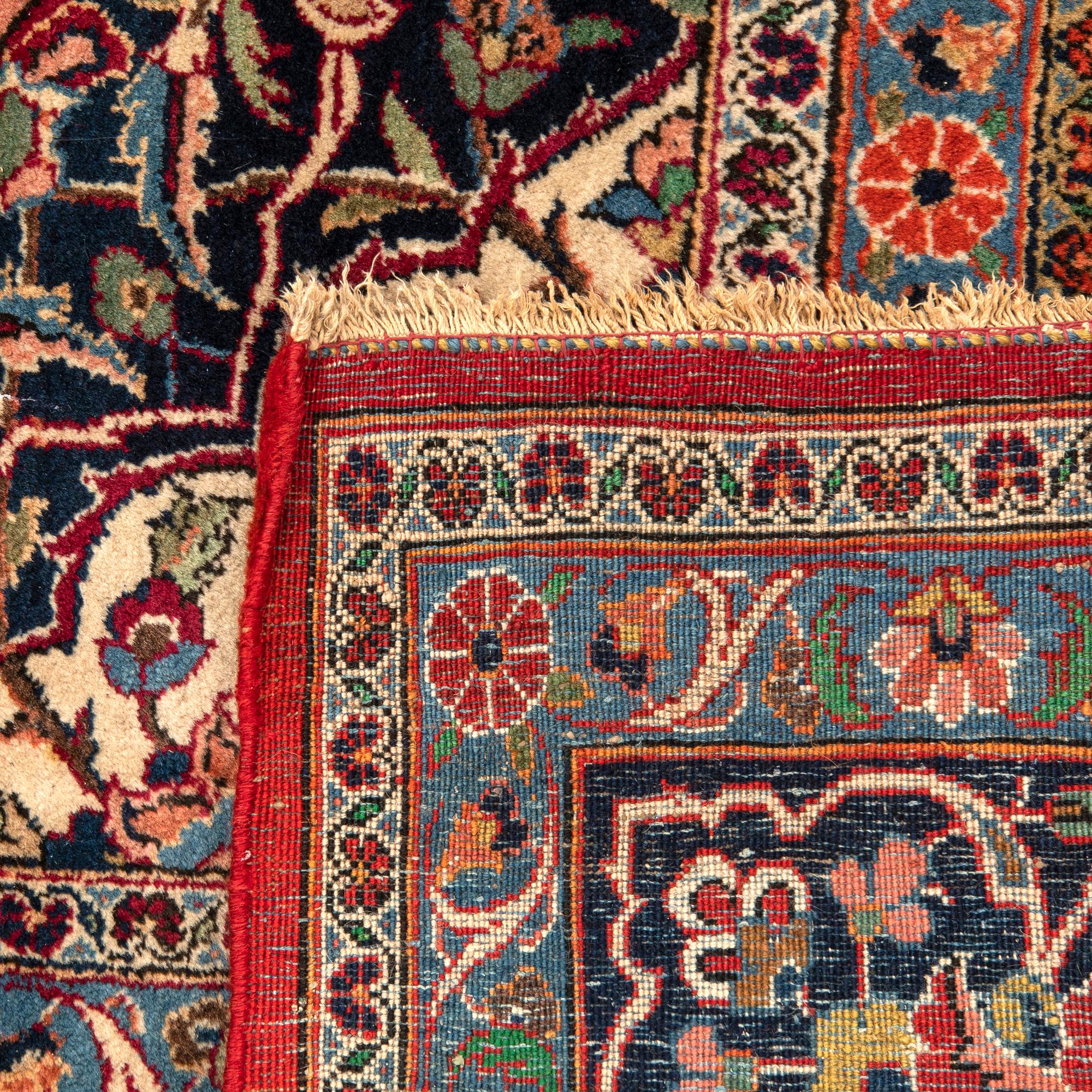 A semaintique/antique Kashan carpet ca 383x265 cm.