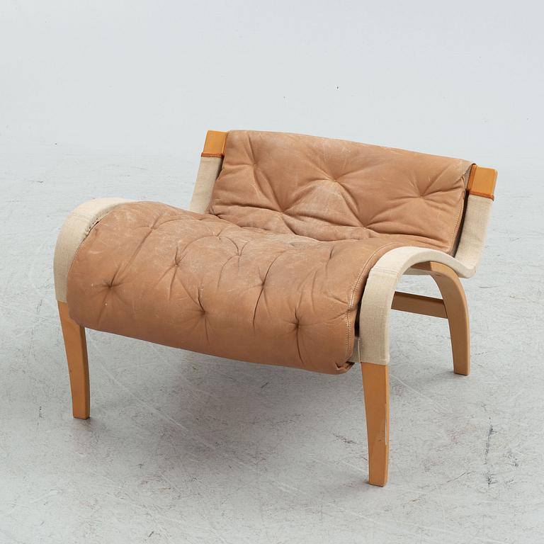 Bruno Mathsson armchair, "Pernilla" with footstool, Dux, late 20th century.