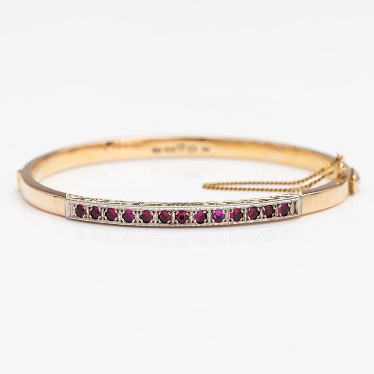 ARMBAND, 14K guld, syntetiska rubiner. Tarkkanen Oy, Helsingfors 1959.
