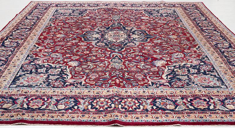 A oriental carpet, c. 375 x 290 cm.