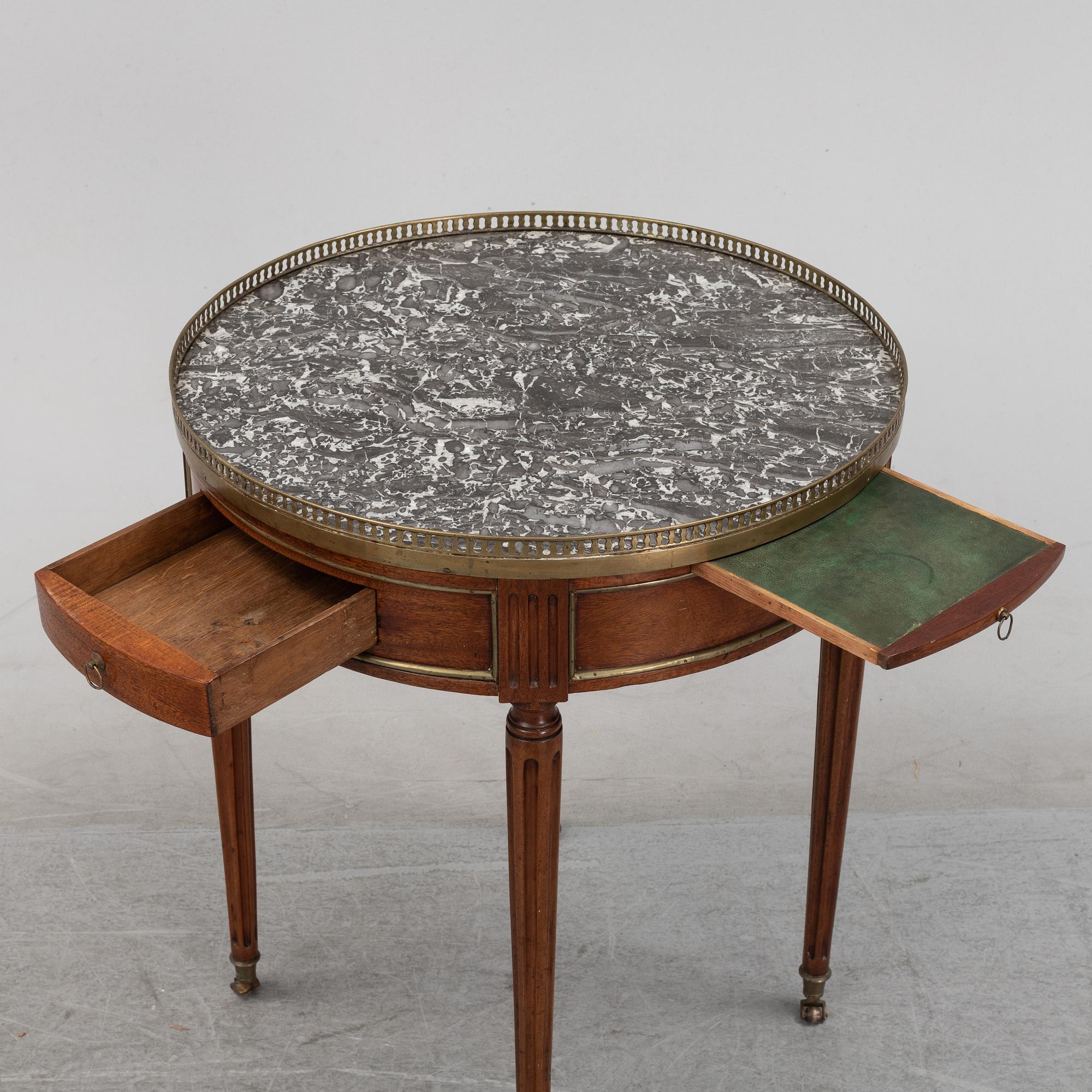 A Louis XVI-style table end of the  19th Century.