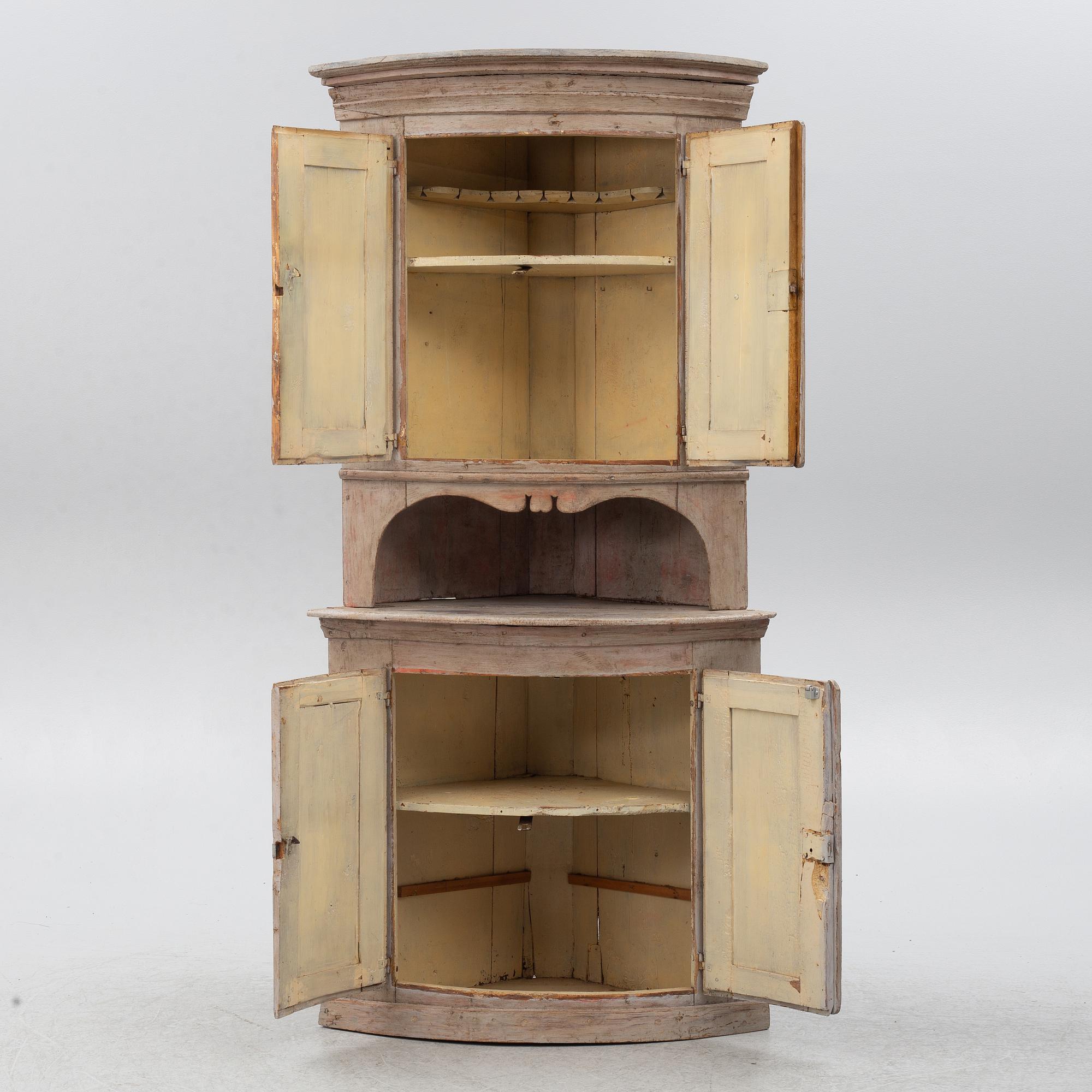 A Gustavian corner cabinet, circa 1800.