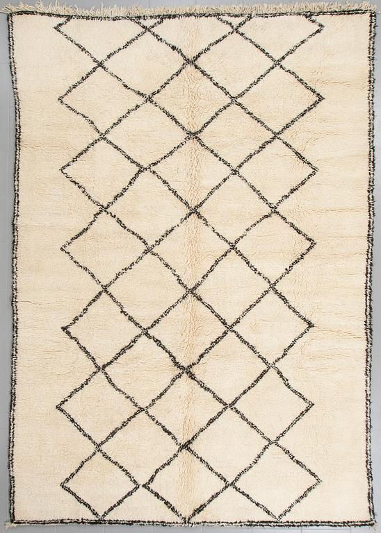 A moroccan rug, 330 x 222 cm.