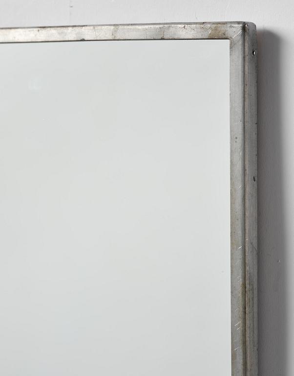 Firma Svenskt Tenn, a pewter wall mirror, Stockholm, 1935.