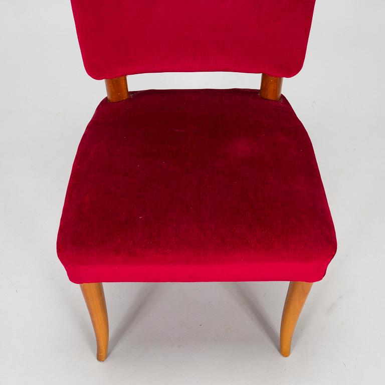 A mid 20th century dining table and a set of four chairs, Oy Boman Ab and two chairs Werner West.