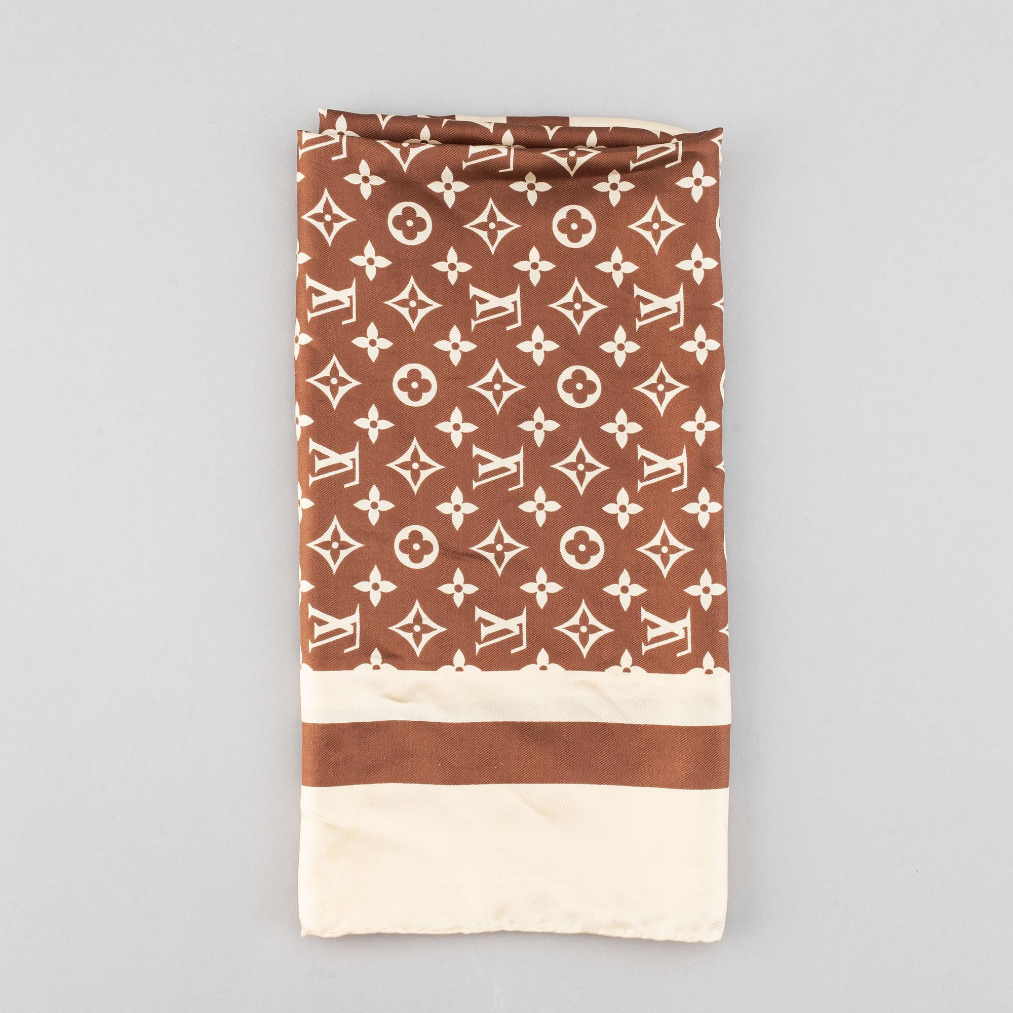 Louis Vuitton, a silk scarf.