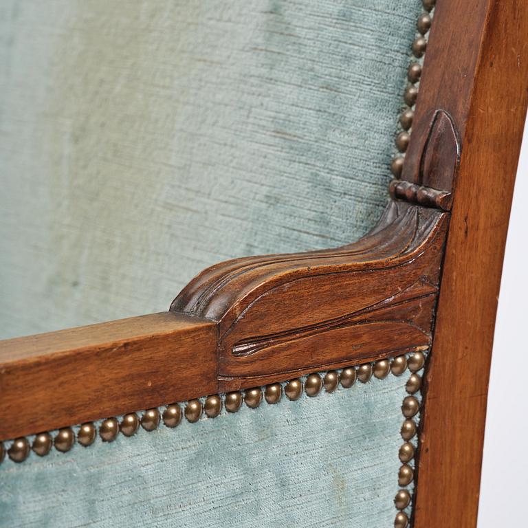 A pair of French Empire mahogny armchairs.