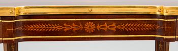 A Directoire style marquetry table from around year 1900.