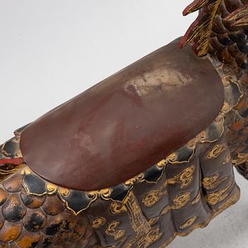 A pair of large Qilin sculptures, lacquered wood, first part of the 20th century.