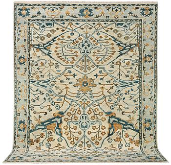 An oriental carpet with Mamluk design, c. 302 x 234 cm.