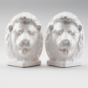 DEKORELEMENT, 2 st, till kakelugn, 1900-talets första hälft.