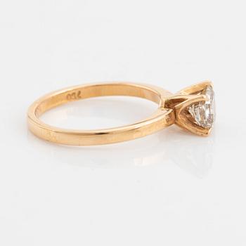 18K rose gold and radiant cut diamond ring.