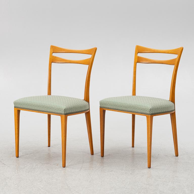 A dining table and four chairs, 1950s-60s.