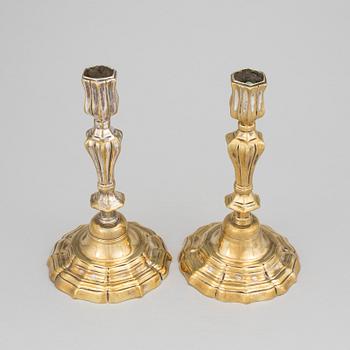 A pair of argent haché candlesticks, mid 18th century.