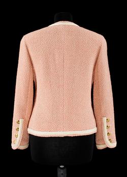 A pink/white bouclé jacket by Chanel.