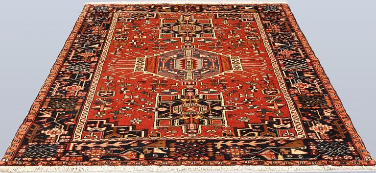 A Heris rug, approx. 191 x 157 cm.